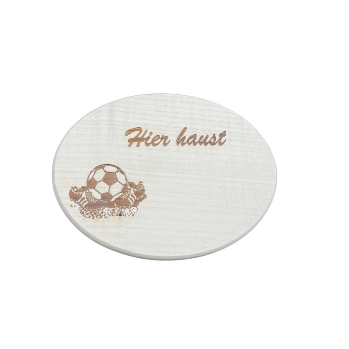 Türschild aus Ahorn "Hier haust" mit Gravur