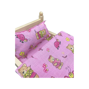 Die Holzwarenfabrik Puppenbett mit Bezug in rosa (44 cm) - Details